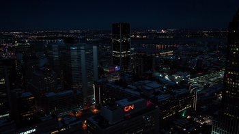 Movie still from “The Dissident” (2020), directed by Bryan Fogel – An aerial view of a large city at night time; Extreme Wide shot, High angle