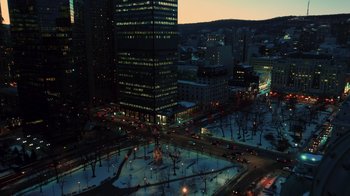 Movie still from “The Dissident” (2020), directed by Bryan Fogel – An aerial view of a city at night with lights on; Extreme Wide shot, High angle