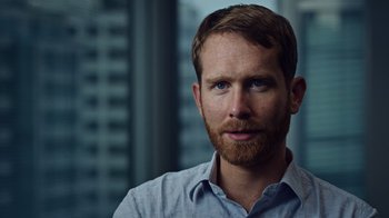 Movie still from “The Dissident” (2020), directed by Bryan Fogel – A person with a beard; Close Up shot, High angle