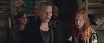 Movie still from “The Divergent Series: Insurgent” (2015), directed by Robert Schwentke – A group of men standing next to each other in a room; Close Up shot, Over the shoulder angle