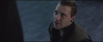 Movie still from “The Divergent Series: Insurgent” (2015), directed by Robert Schwentke – A person wearing a jacket; Close Up shot, High angle