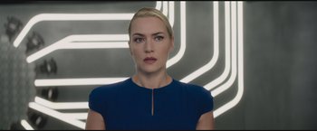 Movie still from “The Divergent Series: Insurgent” (2015), directed by Robert Schwentke – A person wearing a blue shirt; Close Up shot, Low angle