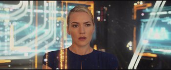 Movie still from “The Divergent Series: Insurgent” (2015), directed by Robert Schwentke – A person wearing a blue shirt; Close Up shot, Over the shoulder angle