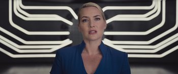 Movie still from “The Divergent Series: Insurgent” (2015), directed by Robert Schwentke – A person wearing a blue shirt; Close Up shot, Low angle