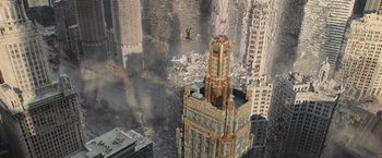 Movie still from “The Divergent Series: Insurgent” (2015), directed by Robert Schwentke – An aerial view of a building with a clock on it; Extreme Wide shot, Overhead angle