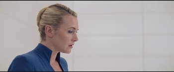 Movie still from “The Divergent Series: Insurgent” (2015), directed by Robert Schwentke – A person wearing a blue shirt; Close Up shot, Low angle