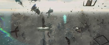 Movie still from “The Divergent Series: Insurgent” (2015), directed by Robert Schwentke – A man standing on top of an island in the middle of the ocean; Extreme Wide shot, High angle