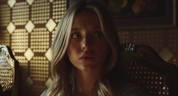 Movie still from “Euphoria” (2019), created by Sam Levinson – A beautiful young woman with long blonde hair and green eyes; Close Up shot, Low angle