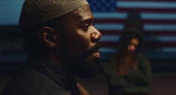 Movie still from “Euphoria” (2019), created by Sam Levinson – A man with a beard wearing a hat; Close Up shot, Over the shoulder angle