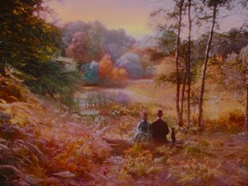 Movie still from “The Electrical Life of Louis Wain” (2021), directed by Will Sharpe – A painting of two people sitting on a bench; Extreme Wide shot, High angle