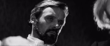 Movie still from “The Elephant Man” (1980), directed by David Lynch – Black and white photograph of a man with a beard; Close Up shot, Low angle