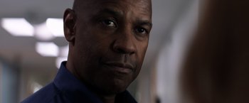 Movie still from “The Equalizer” (2014), directed by Antoine Fuqua – A man's face in a room; Close Up shot, Low angle