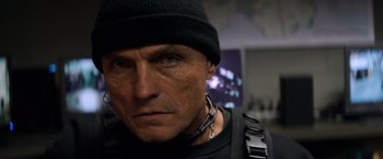 Movie still from “The Equalizer” (2014), directed by Antoine Fuqua – A person wearing a hat; Close Up shot, Low angle