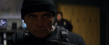 Movie still from “The Equalizer” (2014), directed by Antoine Fuqua – A person wearing a hat; Close Up shot, Low angle