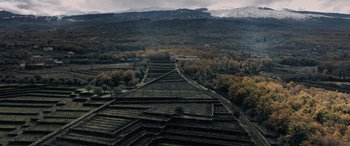 Movie still from “The Equalizer 3” (2023), directed by Antoine Fuqua – An aerial view of an area that looks like a valley; Extreme Wide shot, High angle