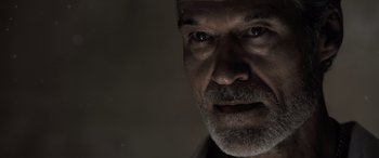 Movie still from “The Equalizer 3” (2023), directed by Antoine Fuqua – A person with a beard; Close Up shot, Low angle