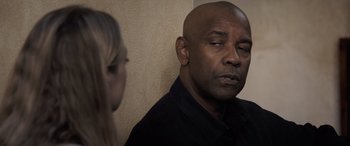 Movie still from “The Equalizer 3” (2023), directed by Antoine Fuqua – An older man and a young woman looking at each other; Close Up shot, Over the shoulder angle