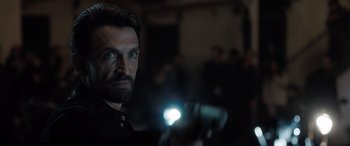 Movie still from “The Equalizer 3” (2023), directed by Antoine Fuqua – A person holding a flashlight; Close Up shot, Over the shoulder angle