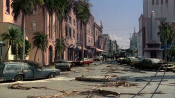 Movie still from “Day of the Dead” (1985), directed by George A. Romero – A city street filled with cars and debris; Extreme Wide shot, High angle
