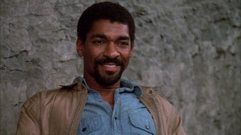 Movie still from “Day of the Dead” (1985), directed by George A. Romero – A person wearing a jacket; Close Up shot, Low angle