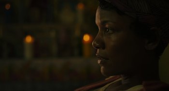 Movie still from “The Exorcist: Believer” (2023), directed by David Gordon Green – A woman's face at night; Close Up shot, Low angle