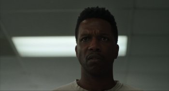 Movie still from “The Exorcist: Believer” (2023), directed by David Gordon Green – A person looking at the camera; Close Up shot, Low angle