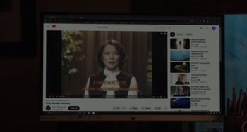 Movie still from “The Exorcist: Believer” (2023), directed by David Gordon Green – A computer screen showing a video of a woman in front of a tree; Extreme Close Up shot, Over the shoulder angle