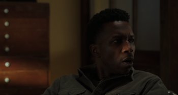 Movie still from “The Exorcist: Believer” (2023), directed by David Gordon Green – A person wearing a jacket; Close Up shot, Over the shoulder angle