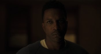 Movie still from “The Exorcist: Believer” (2023), directed by David Gordon Green – A person looking at the camera; Close Up shot, Low angle