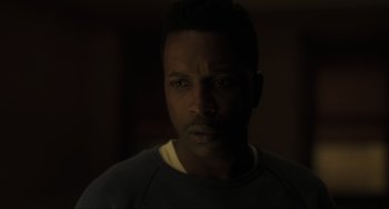 Movie still from “The Exorcist: Believer” (2023), directed by David Gordon Green – A person wearing a sweater; Close Up shot, Over the shoulder angle