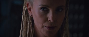 Movie still from “The Fate of the Furious” (2017), directed by F. Gary Gray – A person with dreads; Close Up shot, Over the shoulder angle