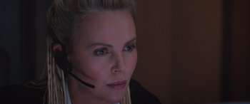 Movie still from “The Fate of the Furious” (2017), directed by F. Gary Gray – A person wearing a headset; Close Up shot, High angle