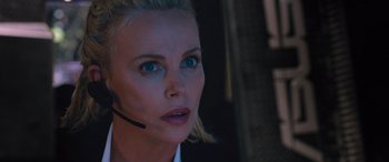 Movie still from “The Fate of the Furious” (2017), directed by F. Gary Gray – A person wearing a headset; Close Up shot, Over the shoulder angle