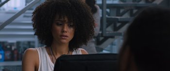Movie still from “The Fate of the Furious” (2017), directed by F. Gary Gray – A person using a computer; Close Up shot, Over the shoulder angle