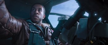 Movie still from “The Fate of the Furious” (2017), directed by F. Gary Gray – A person in a vehicle; Close Up shot, Low angle