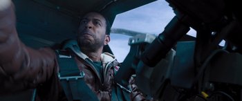 Movie still from “The Fate of the Furious” (2017), directed by F. Gary Gray – A person in a fighter jet cockpit; Close Up shot, Low angle