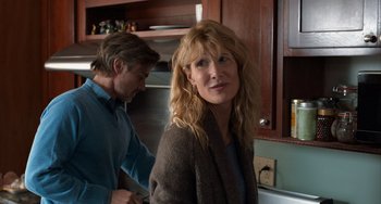 Movie still from “The Fault in Our Stars” (2014), directed by Josh Boone – A man and a woman in a kitchen; Medium shot, Over the shoulder angle