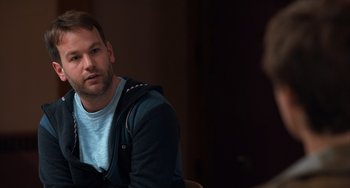 Movie still from “The Fault in Our Stars” (2014), directed by Josh Boone – A person sitting in front of another person; Close Up shot, Over the shoulder angle