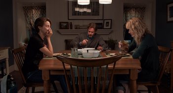 Movie still from “The Fault in Our Stars” (2014), directed by Josh Boone – A group of people sitting around a table eating food; Wide shot, High angle