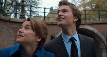 Movie still from “The Fault in Our Stars” (2014), directed by Josh Boone – A man and a woman looking up at the sky; Medium shot, Low angle