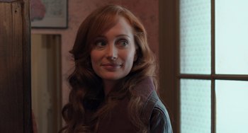 Movie still from “The Fault in Our Stars” (2014), directed by Josh Boone – A person with long red hair; Close Up shot, Over the shoulder angle
