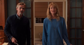 Movie still from “The Fault in Our Stars” (2014), directed by Josh Boone – A man and a woman standing next to each other in a room; Medium shot, Over the shoulder angle