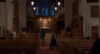 Movie still from “The Fault in Our Stars” (2014), directed by Josh Boone – Two people in a wheelchair inside a church; Extreme Wide shot, Low angle