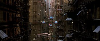Movie still from “The Fifth Element” (1997), directed by Luc Besson – An image of a city with many cars and buildings; Extreme Wide shot, High angle
