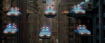 Movie still from “The Fifth Element” (1997), directed by Luc Besson – A bunch of cars that are flying through the air; Extreme Wide shot, High angle