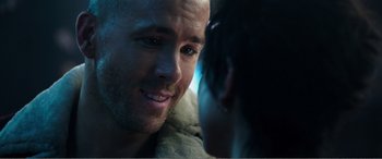 Movie still from “Deadpool” (2016), directed by Tim Miller – A person looking at another person; Close Up shot, Over the shoulder angle