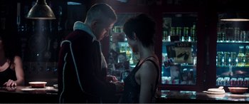 Movie still from “Deadpool” (2016), directed by Tim Miller – A man and a woman looking at each other; Medium shot, Over the shoulder angle