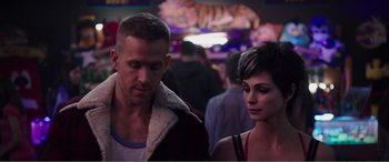 Movie still from “Deadpool” (2016), directed by Tim Miller – A man and a woman standing next to each other; Close Up shot, Over the shoulder angle