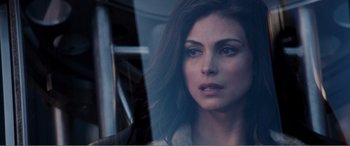 Movie still from “Deadpool” (2016), directed by Tim Miller – A woman sitting in a car looking out the window; Close Up shot, Over the shoulder angle