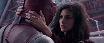Movie still from “Deadpool” (2016), directed by Tim Miller – A man and a woman face each other in a room; Close Up shot, Over the shoulder angle